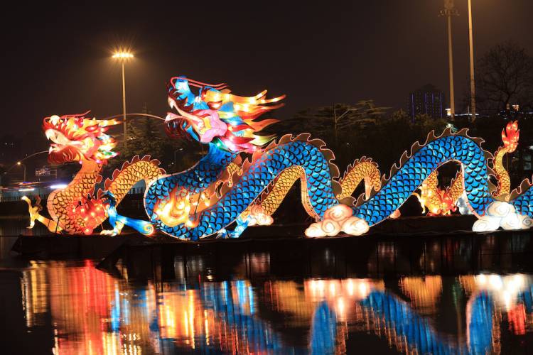 blue and red illuminated Chinese dragons